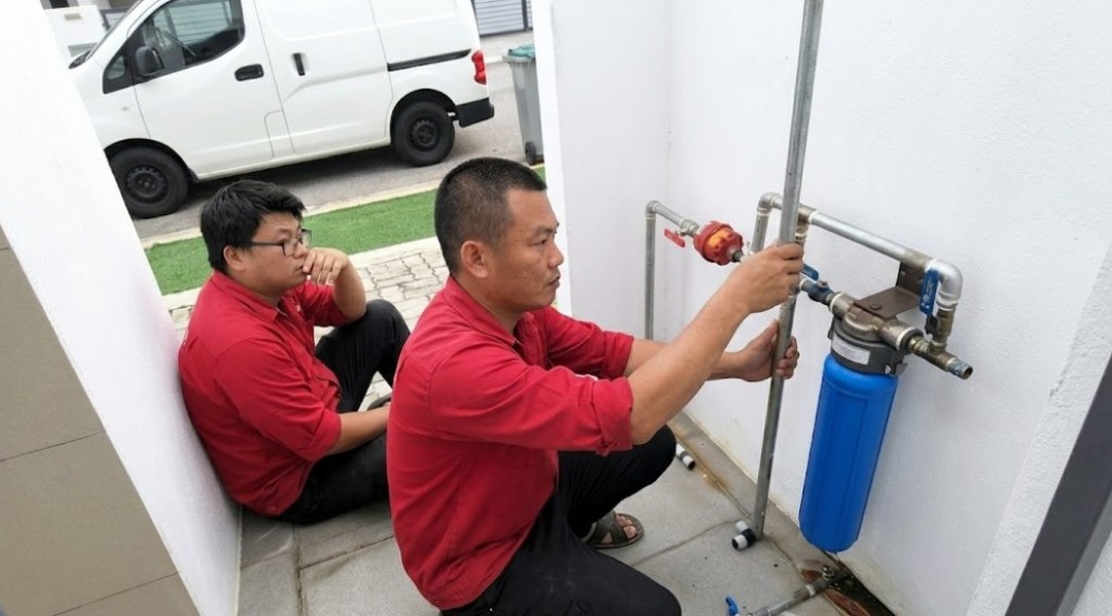AFE Plumbing technicians installing a water filtration system