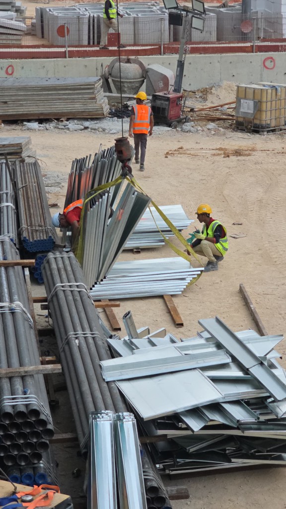 Removal crew preparing site materials for collection